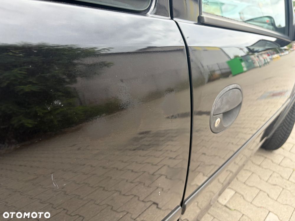 Opel Corsa 1.0 12V Cosmo - 7