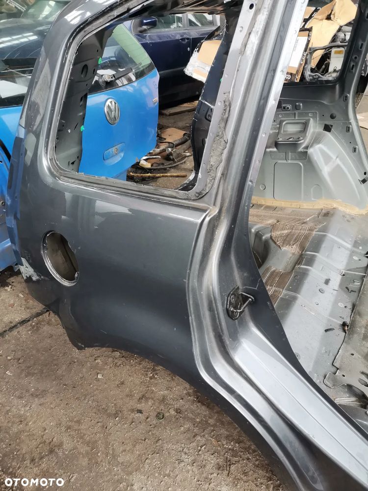 Blotnik prawy lewy TYL cwiartka FORD C-MAX MK1 - 2