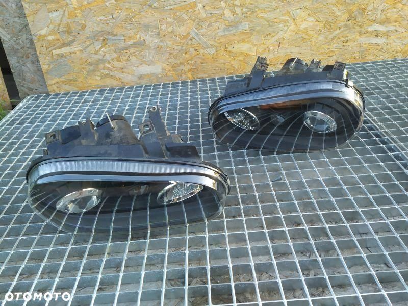 REFLEKTOR 2 SZT KPL EUROPA DEPO LEWA PRAWA VW GOLF IV MK4 SOCZEWKA PRZÓD - 2