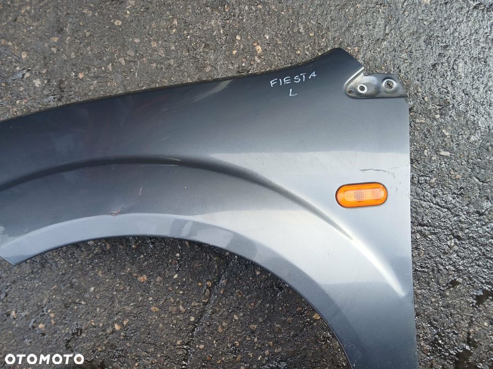 Ford Fiesta Mk6 Błotnik lewy - 3