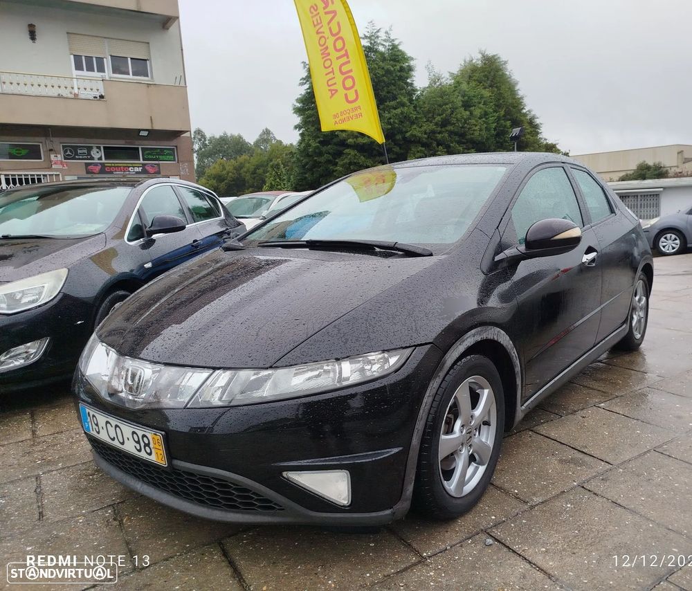 Honda Civic 1.4 Comfort - 1