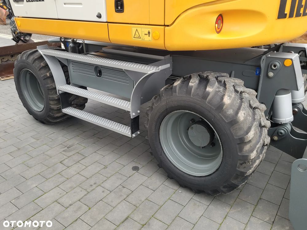 Liebherr A910 compact / 9200h / SUPER STAN / - 9