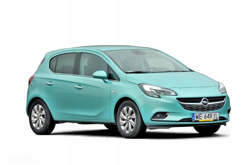 Opel Corsa E Reflektor Główny Strona Prawa 1216858 - 2