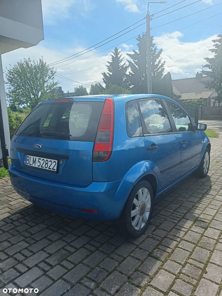 Ford Fiesta 1.4 Ghia - 4
