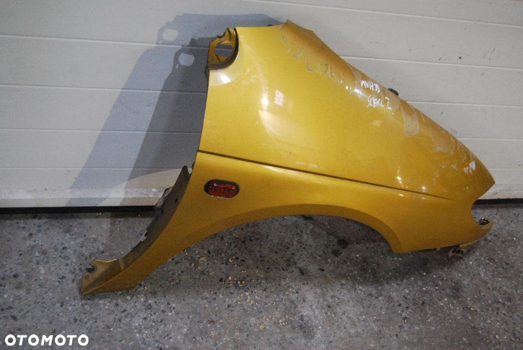 BŁOTNIK PRAWY PRZÓD RENAULT SCENIC I 1999R. MVH39 - 5