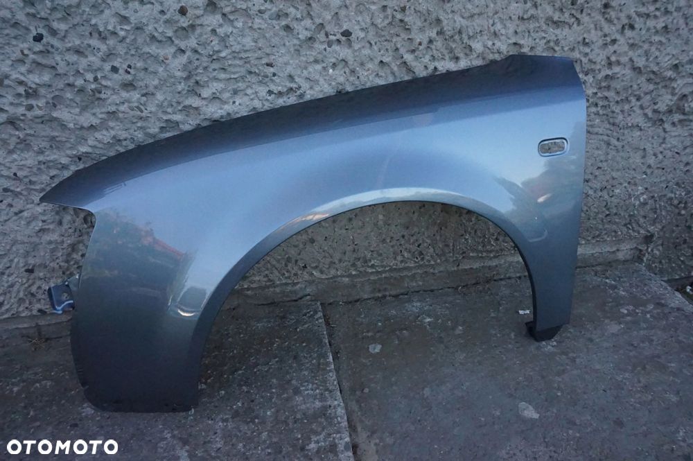 BŁOTNIK PRZEDNI LEWY AUDI A4 B6 LY7L 00/04r