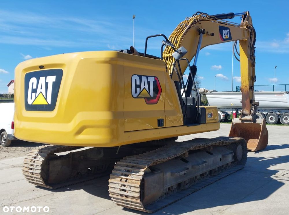 Caterpillar 323 - 10