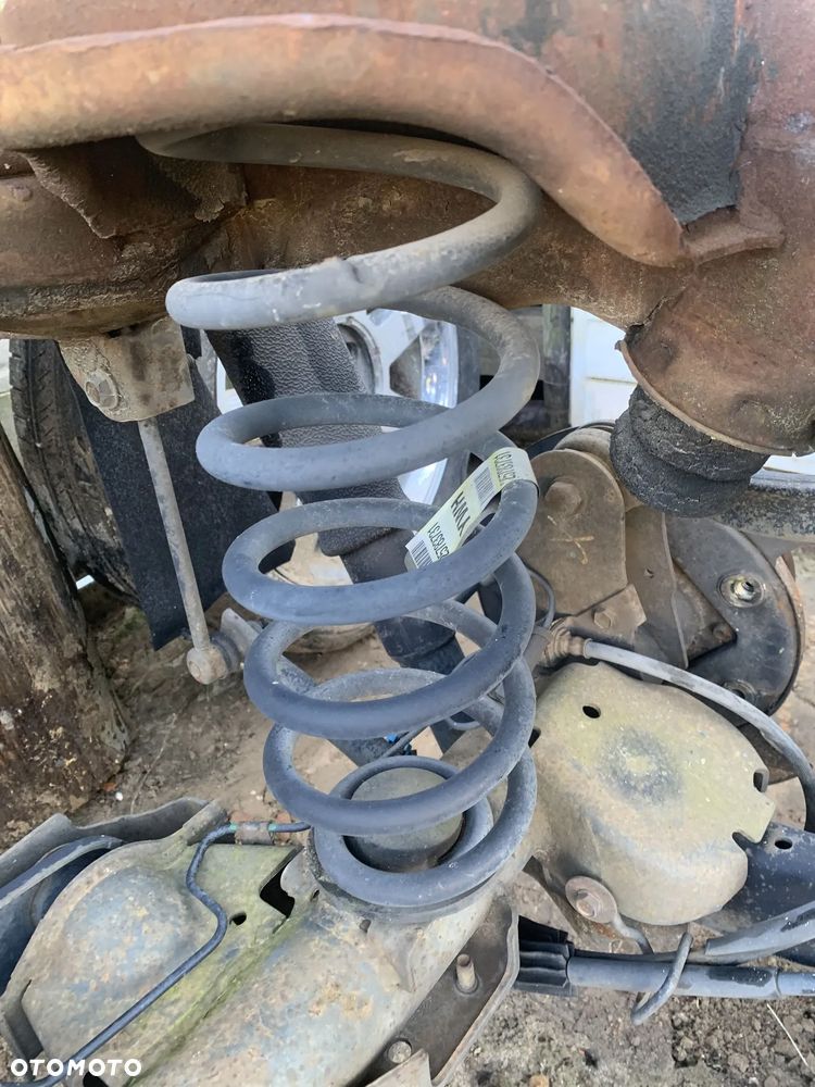 CADILLAC ESCALADE III 6.2 V8 2006-2014 SPRĘŻYNA ZAWIESZENIA TYLNA TYŁ LEWA PRAWA - 1