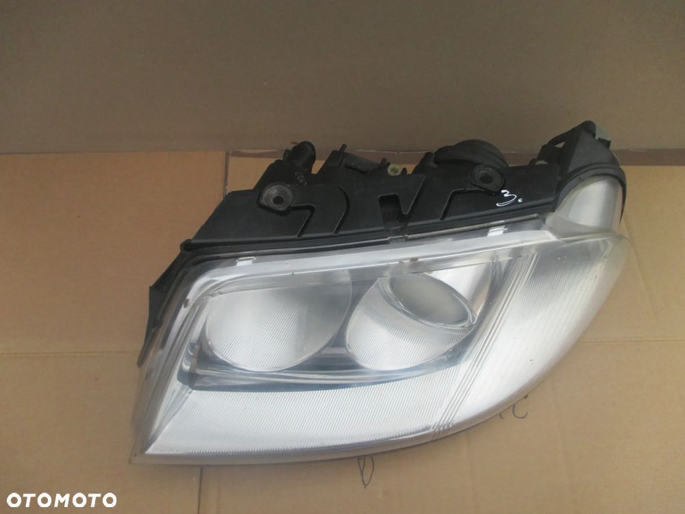 lampa lewa VW Passat B5 lift Hella Europa - 3