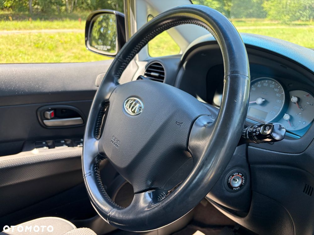 Kia Carens 2.0 CVVT EX Top - 12