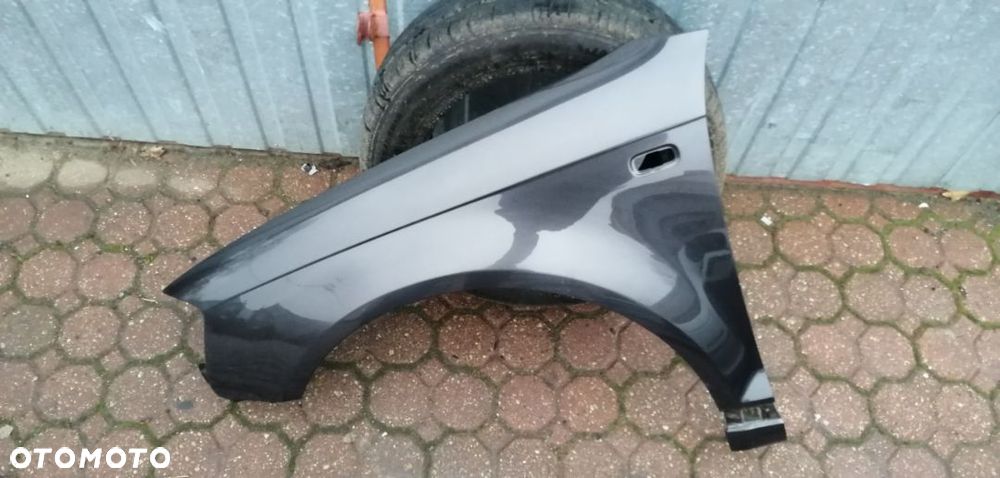 BŁOTNIK  AUDI A3 8P  LEWY   PRZÓD KOLOR LZ7L - 1