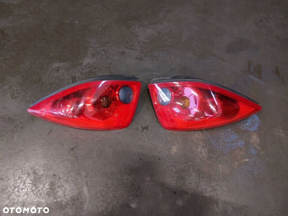 ZDERZAK TYŁ + LAMPY NISSAN PRIMERA P12 LIFTBACK - 14