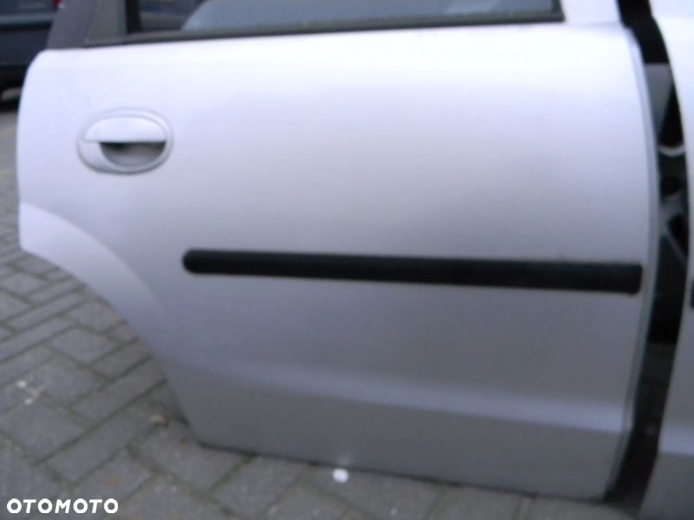 drzwi lewe prawe tył przód OPEL CORSA C Z147 5D - 16