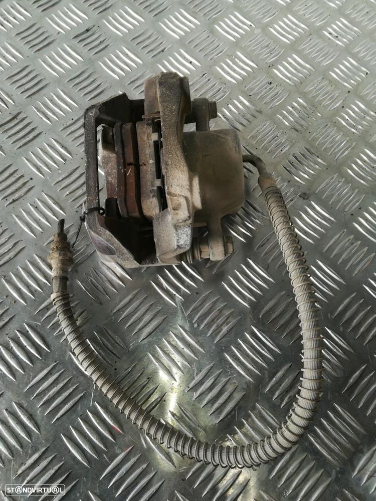 CALÍPER DE FREIO TRASEIRO ESQUERDO SSANGYONG REXTON - 1