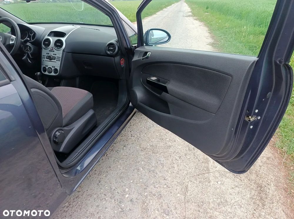 Opel Corsa 1.4 16V Enjoy - 11