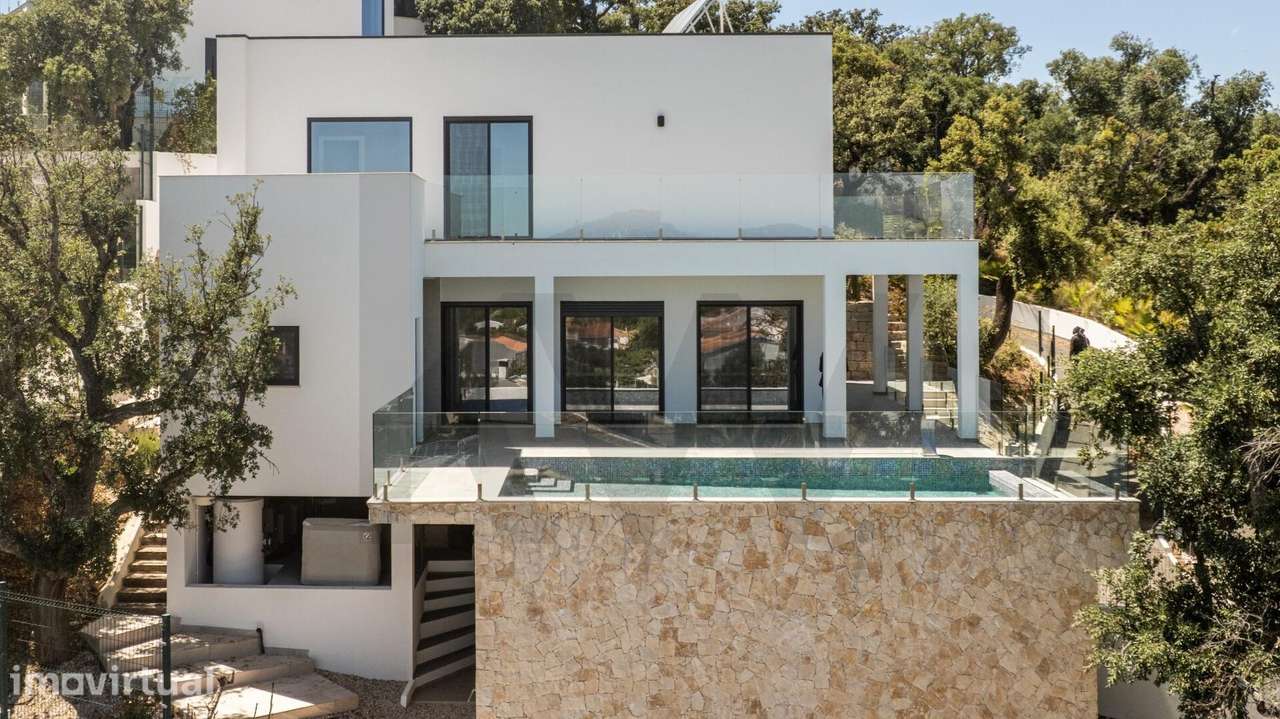 Moradia T5 unifamiliar de arquitetura contemporânea c/ piscina aquecid - Grande imagem: 3/60