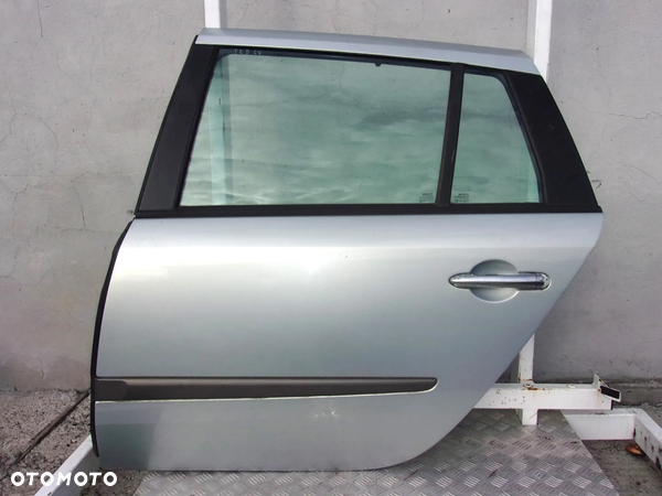 Renault Laguna II KOMBI drzwi lewy tył TEB64