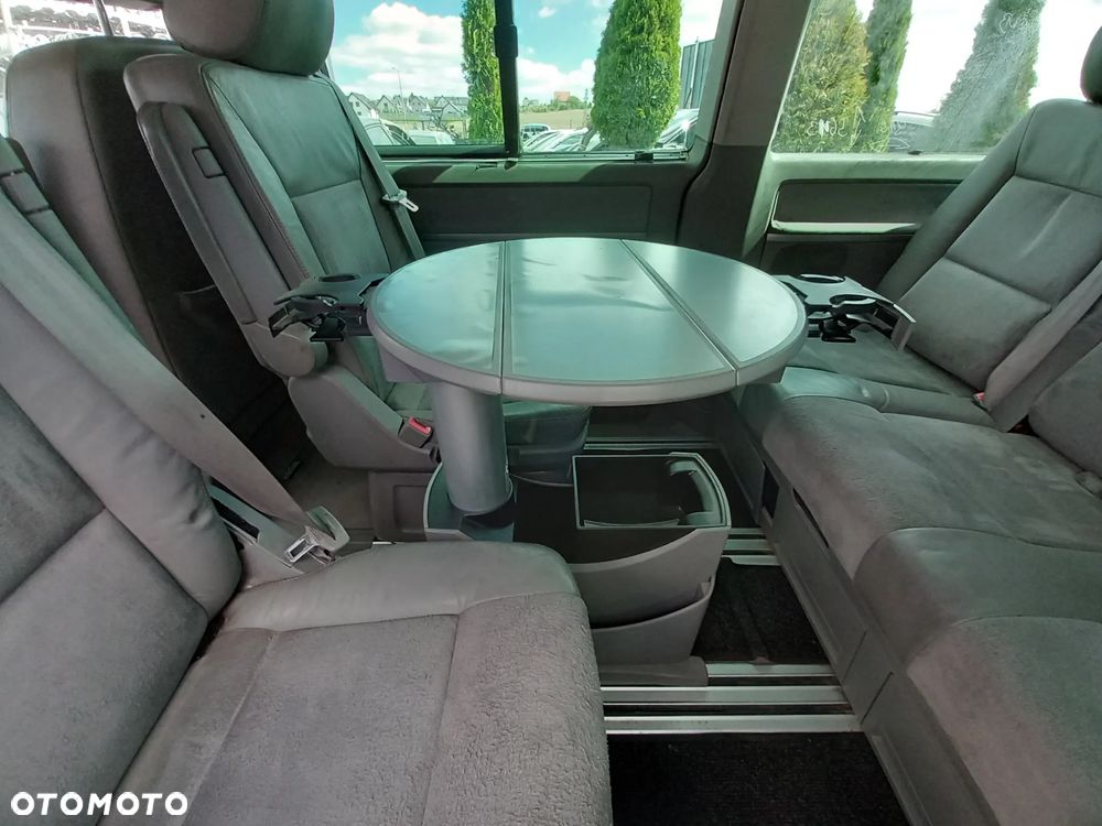 VW TRANSPORTER T5 MULTIVAN KOMPLETNA PRZEKŁADKA FOTELI DYWANÓW PODSUFITKI BOCZKI SŁUPKI NA MULTIVAN KOMPLET Z STOLIKIEM I ROLETĄ SKÓRA ALCANTARA - 5