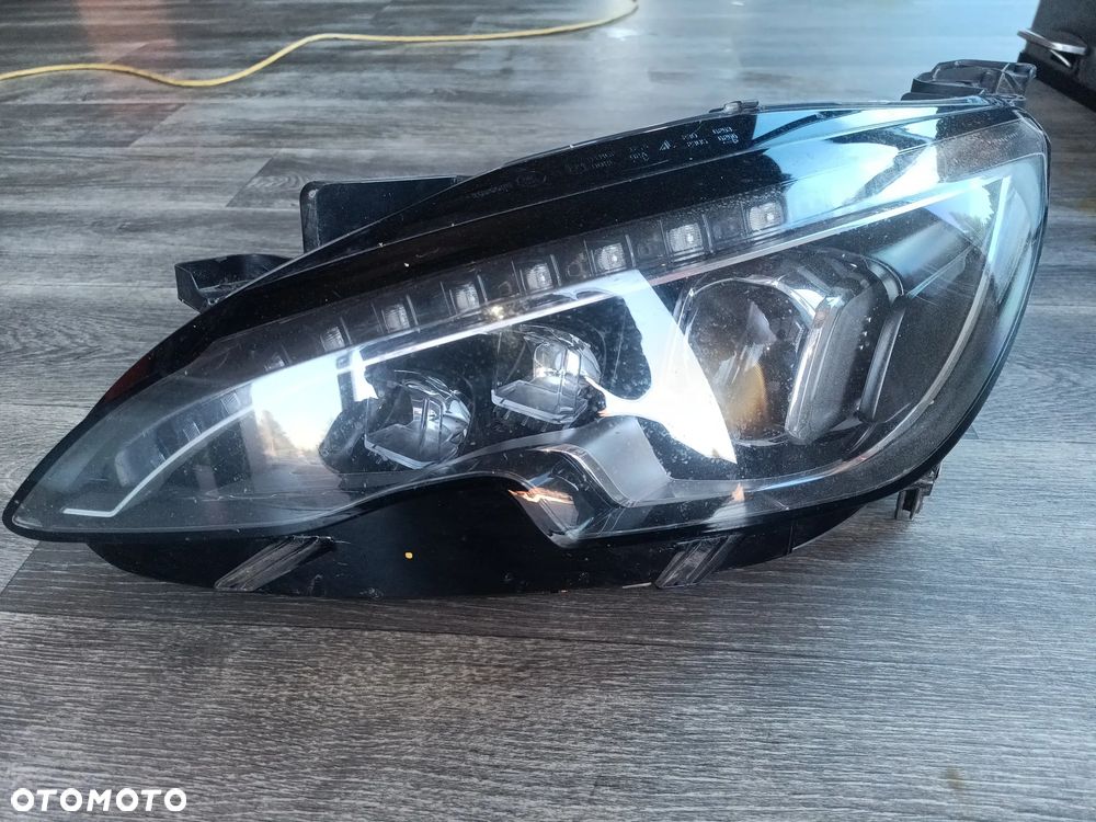 Lampa lewa przednia Peugeot 308 T9 030128723103 - 2