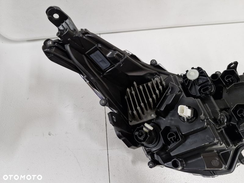 TOYOTA COROLLA E21 LIFT LAMPA REFLEKTOR LEWY PRZÓD EU LED 81150-02X10 - 9