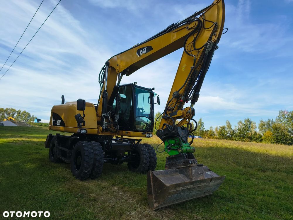 Caterpillar M313D - 1