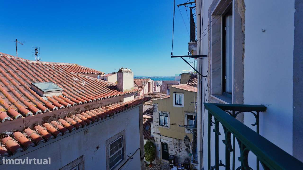 T1 em Alfama com terraço, vista de rio e sol o dia inteiro - Grande imagem: 2/21
