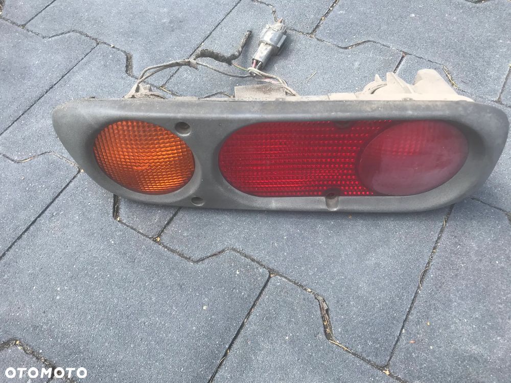 Nissan Terrano II Lift Lampa Lewa w zderzak Europa Idealna - 1