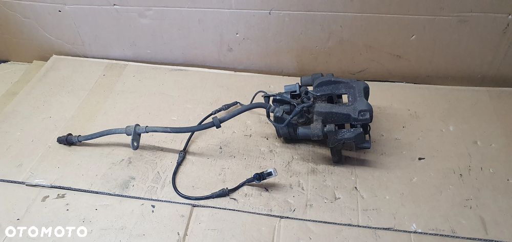 Zacisk hamulcowy prawy tył tylny prawy Land Rover Discovery Sport L550 FK72-2K327-BE - 1