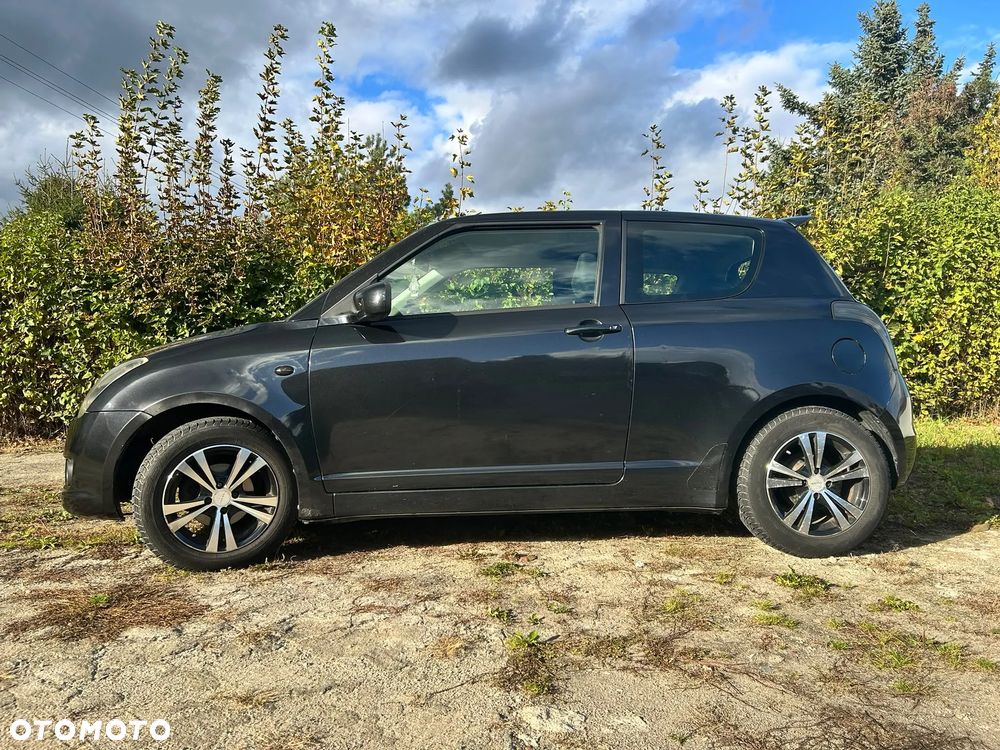Suzuki Swift 2009 photo 2