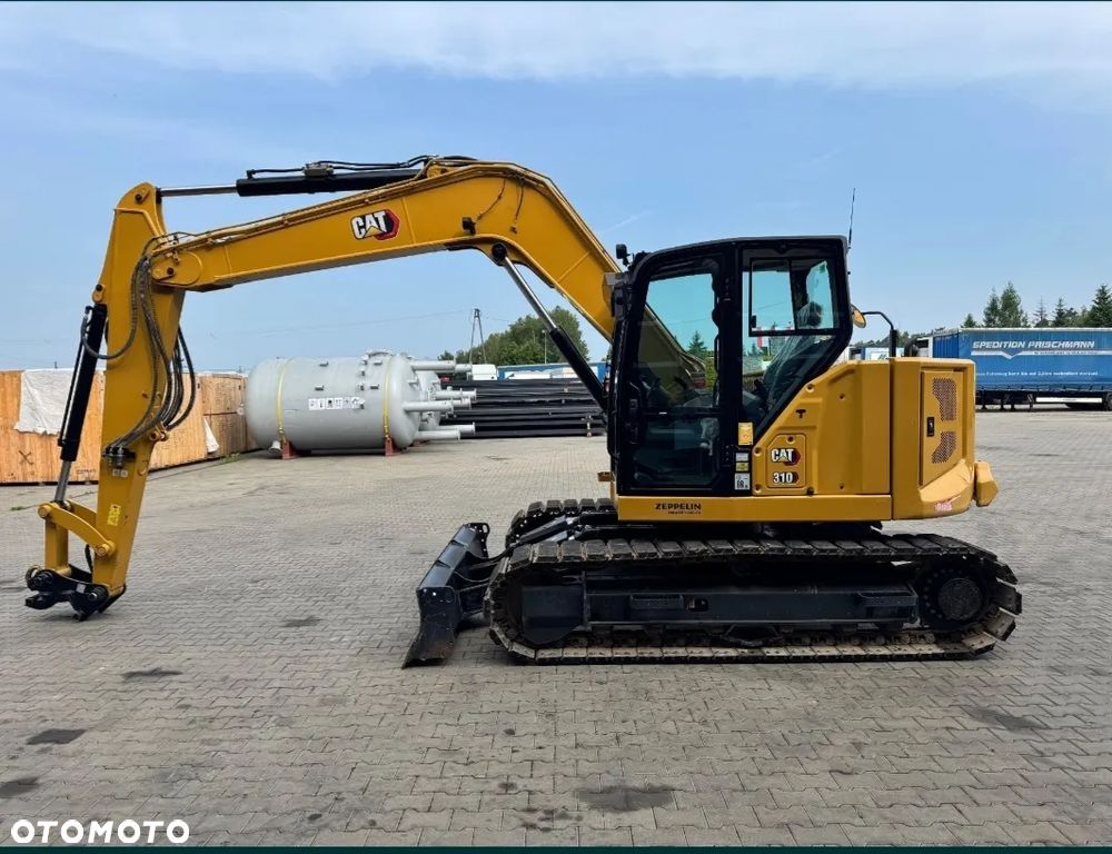 Caterpillar 310 - 1