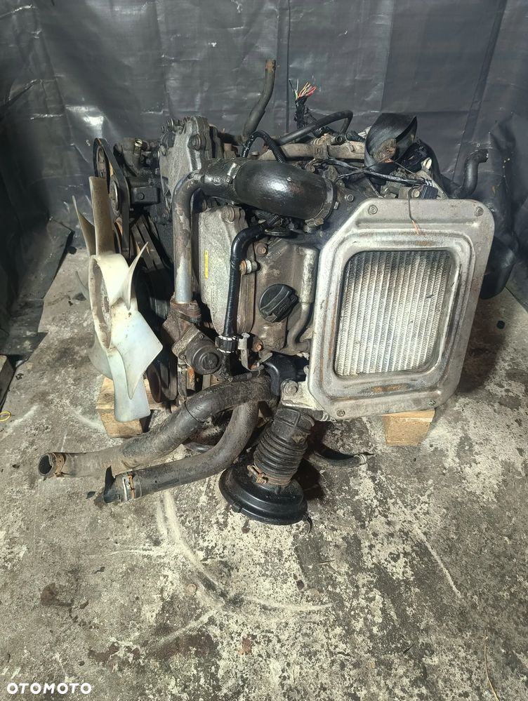 SILNIK NISSAN NAVARA D22 2.5 133HP KOMPLETNY - 1