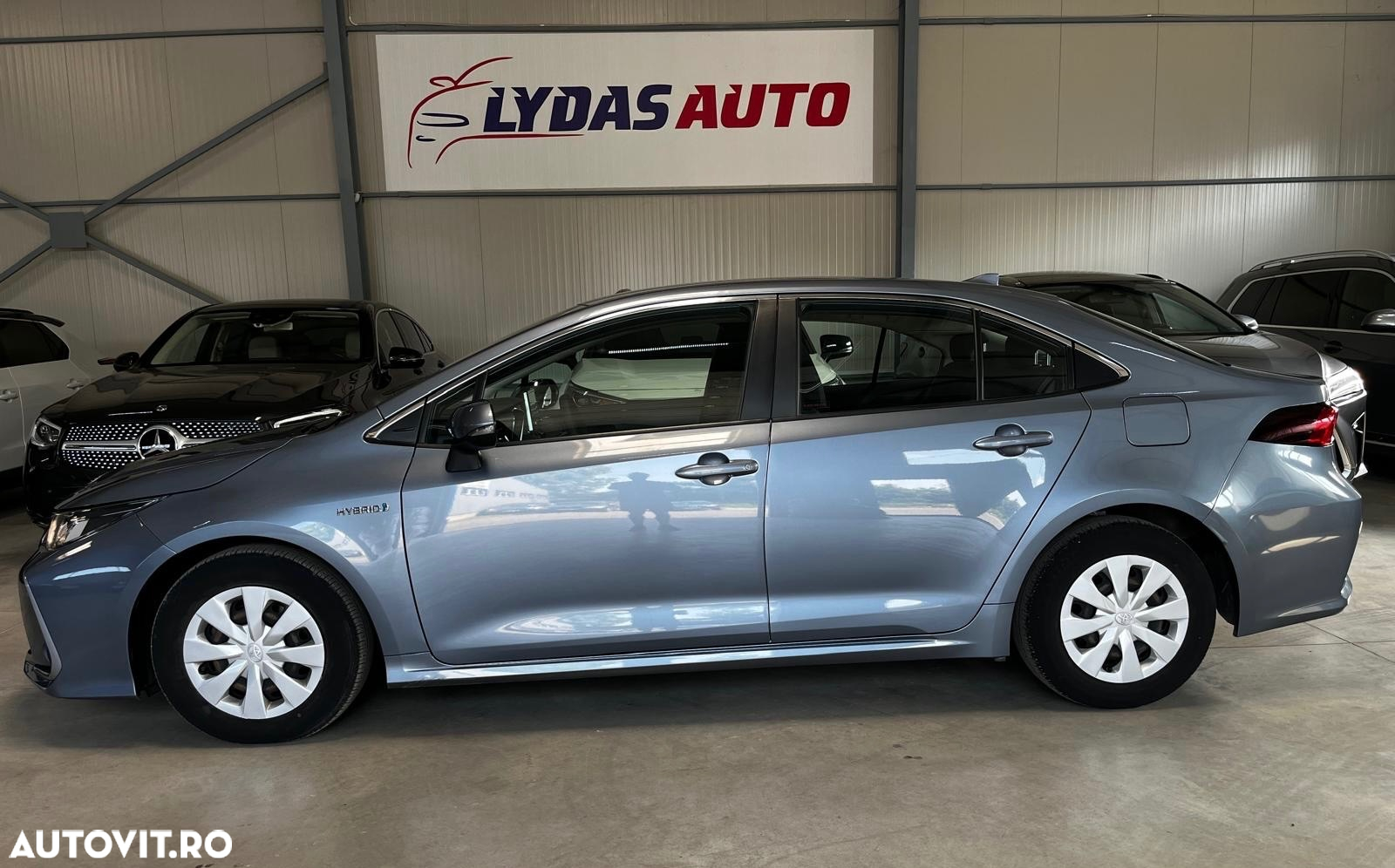 Toyota Corolla 1.8 HSD Business - 2
