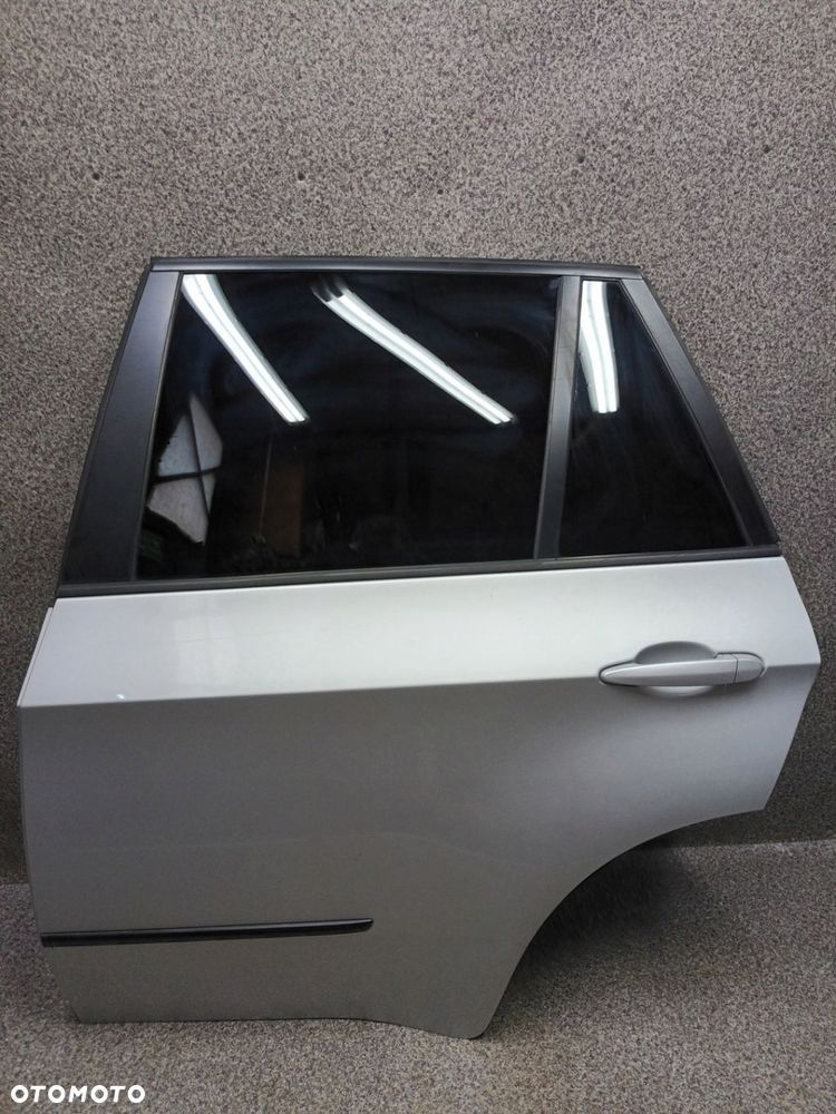 BMW X5 E70 drzwi klamka lewy tyl 354/7 KPL ladne