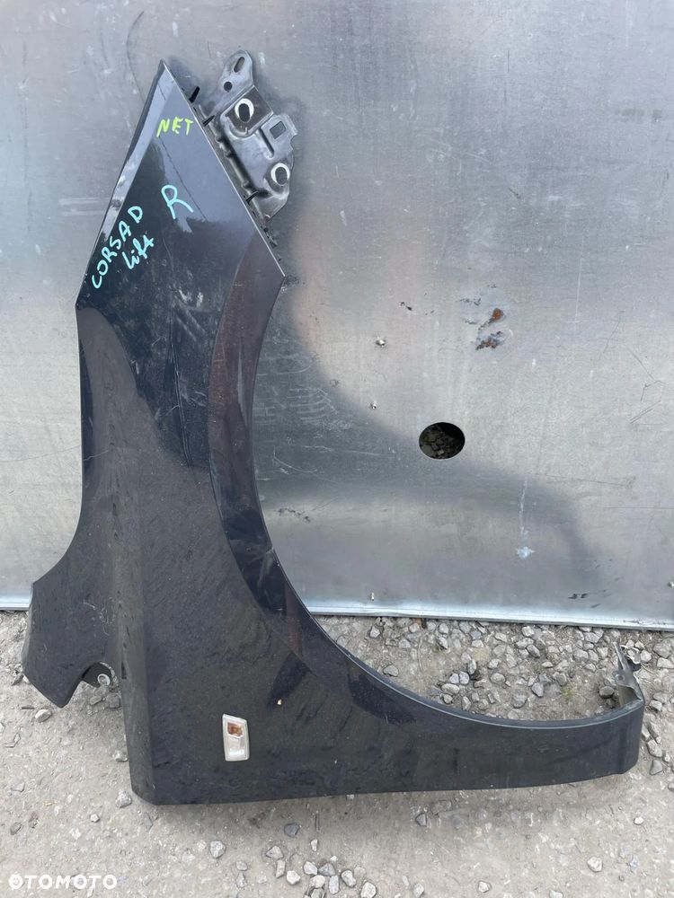 Błotnik przedni prawy Opel Corsa D lift - 1
