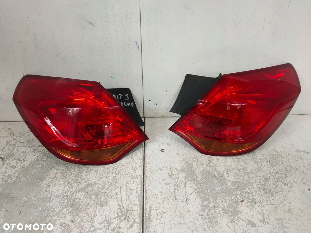 lampa prawa + lewa tył astra 4 j 5d hb jasna komplet