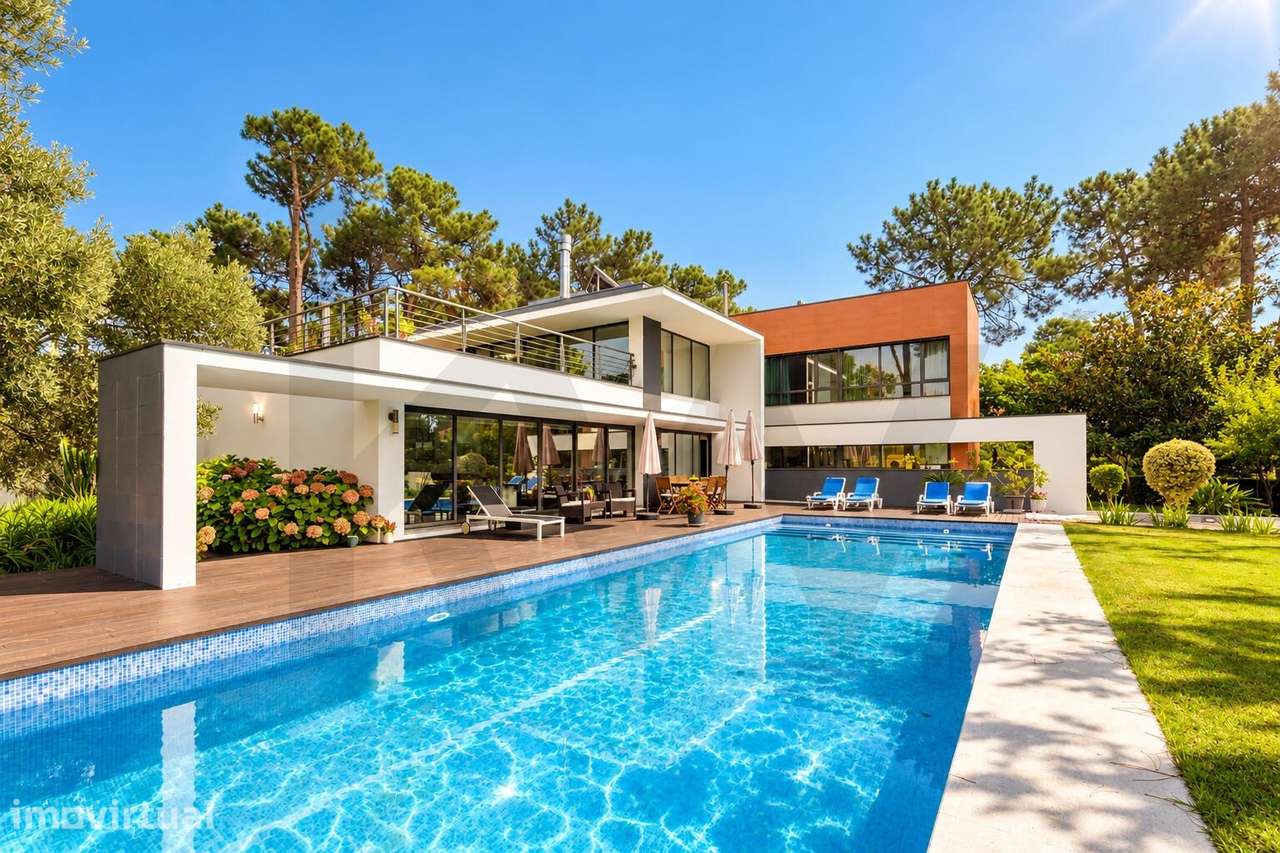 Moradia T4+1 com piscina e terreno de 1.623 m2 na Herdade da Aroeira - Grande imagem: 2/60