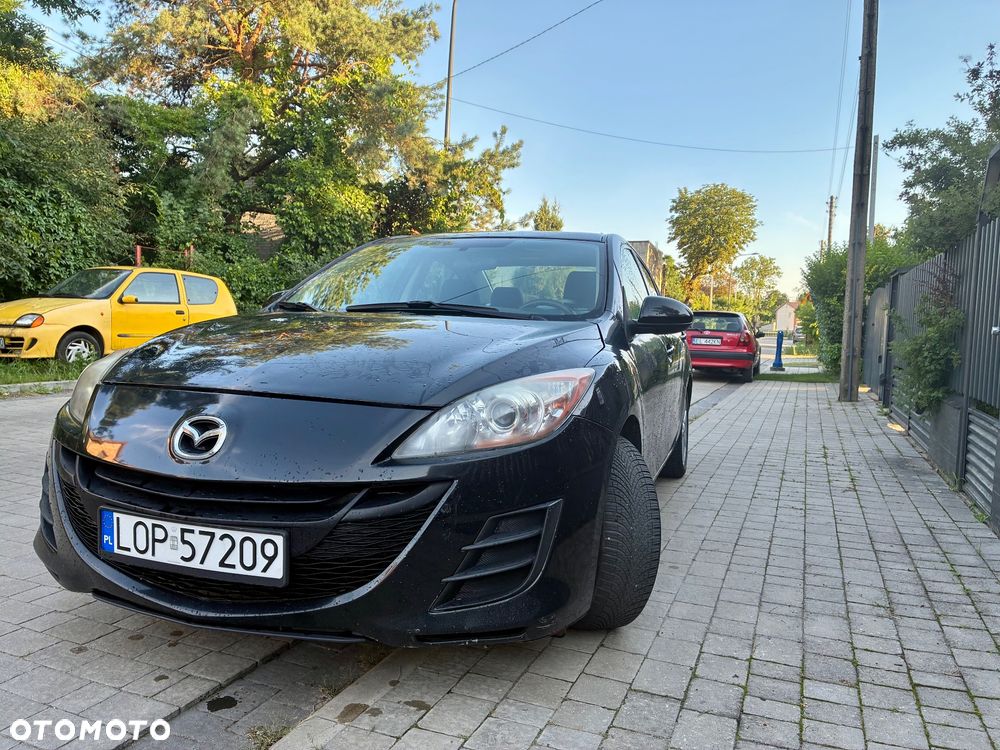 Mazda 3 2.0 Exclusive + - 2