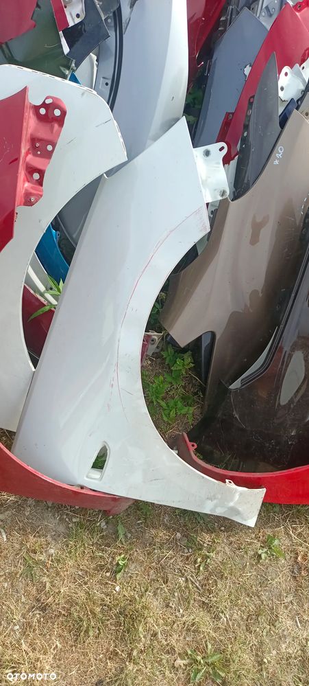 BŁOTNIK PRZEDNI PRAWY Astra k - 1