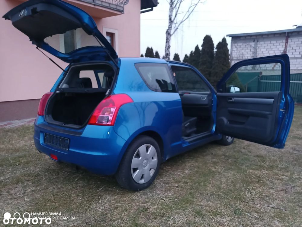 Suzuki Swift 1.3 GLX / Comfort - 32