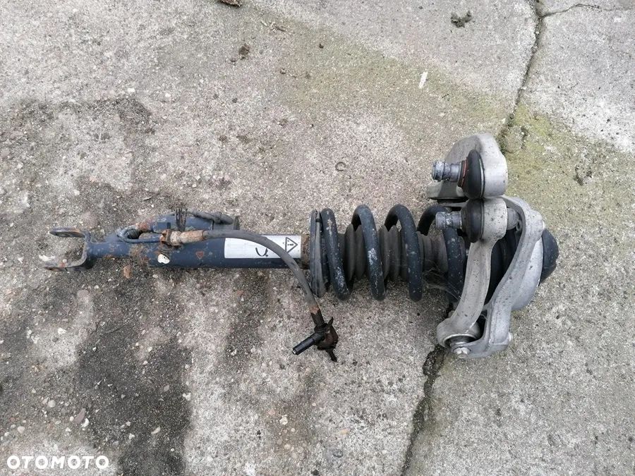 AUDI RS6 A6 C6 5.0 TFSI AMORTYZATOR LEWY PRZÓD 4F0412019B