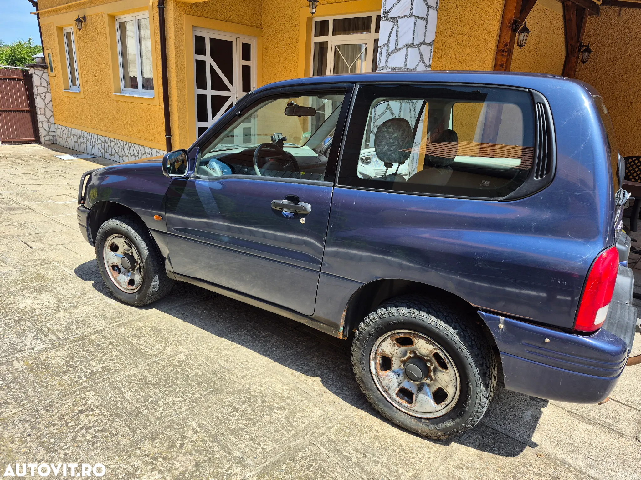Suzuki Grand Vitara 2.0 - 7