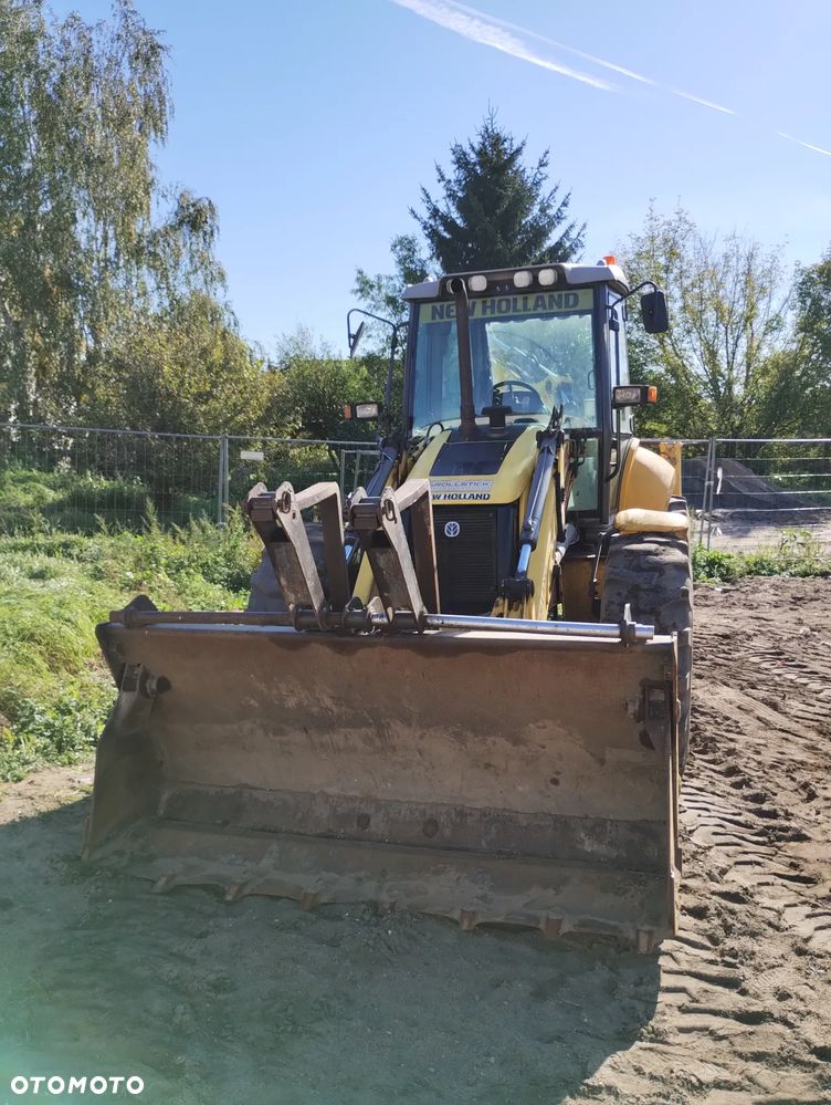 New Holland B115 - 24