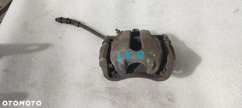 LANCIA YPSYILON ZACISK HAMULCOWY PRAWY PRZÓD - 1