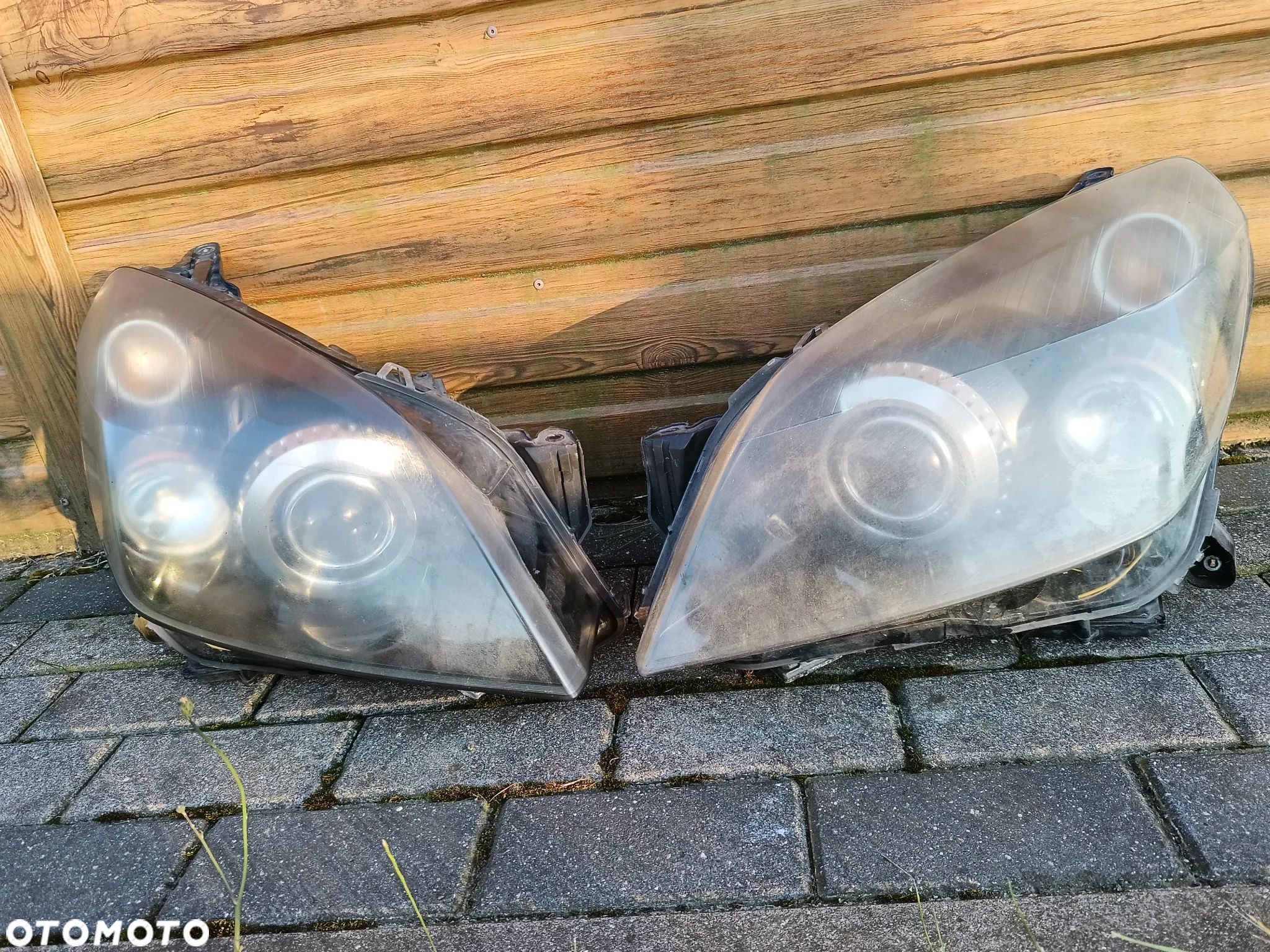 Lampa Opel Astra H III lewy prawy przód Bi-Xenon skrętny kompletna - 1