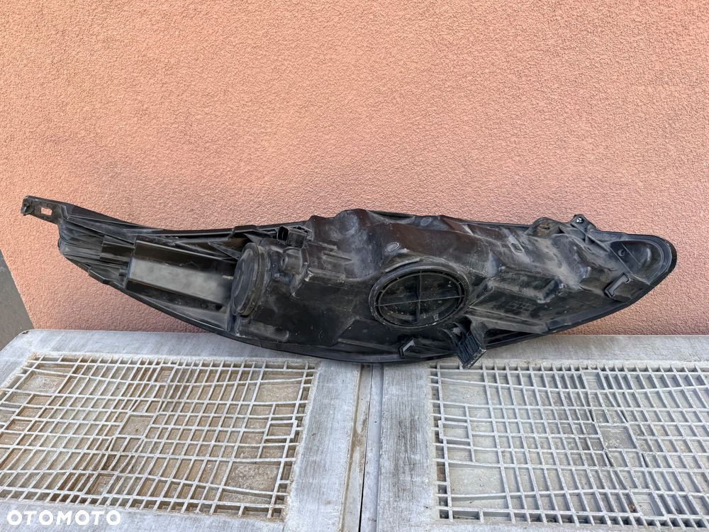 Lampa przednia FORD FIESTA MK7 SOCZEWKA LEWA EUROPA ORYGINALNA HELLA - 3