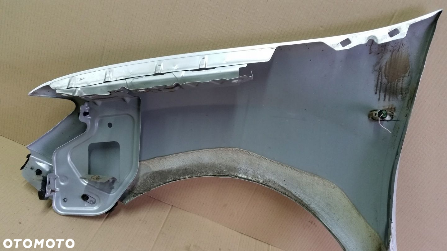 BŁOTNIK PRZÓD PRAWY DACIA LOGAN SANDERO STEPWAY TED 69 - 7