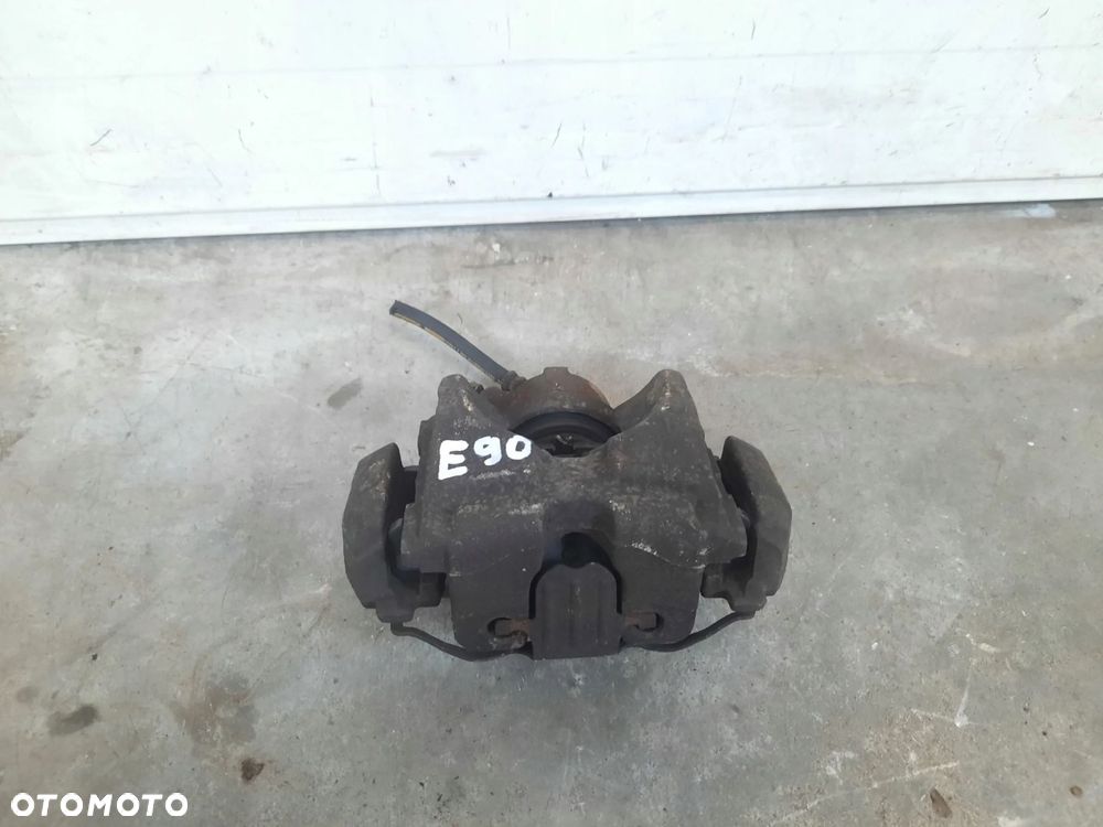 ZACISK LEWY PRZÓD HAMULCOWY BMW 3 E90 E91 2,0 D - 2