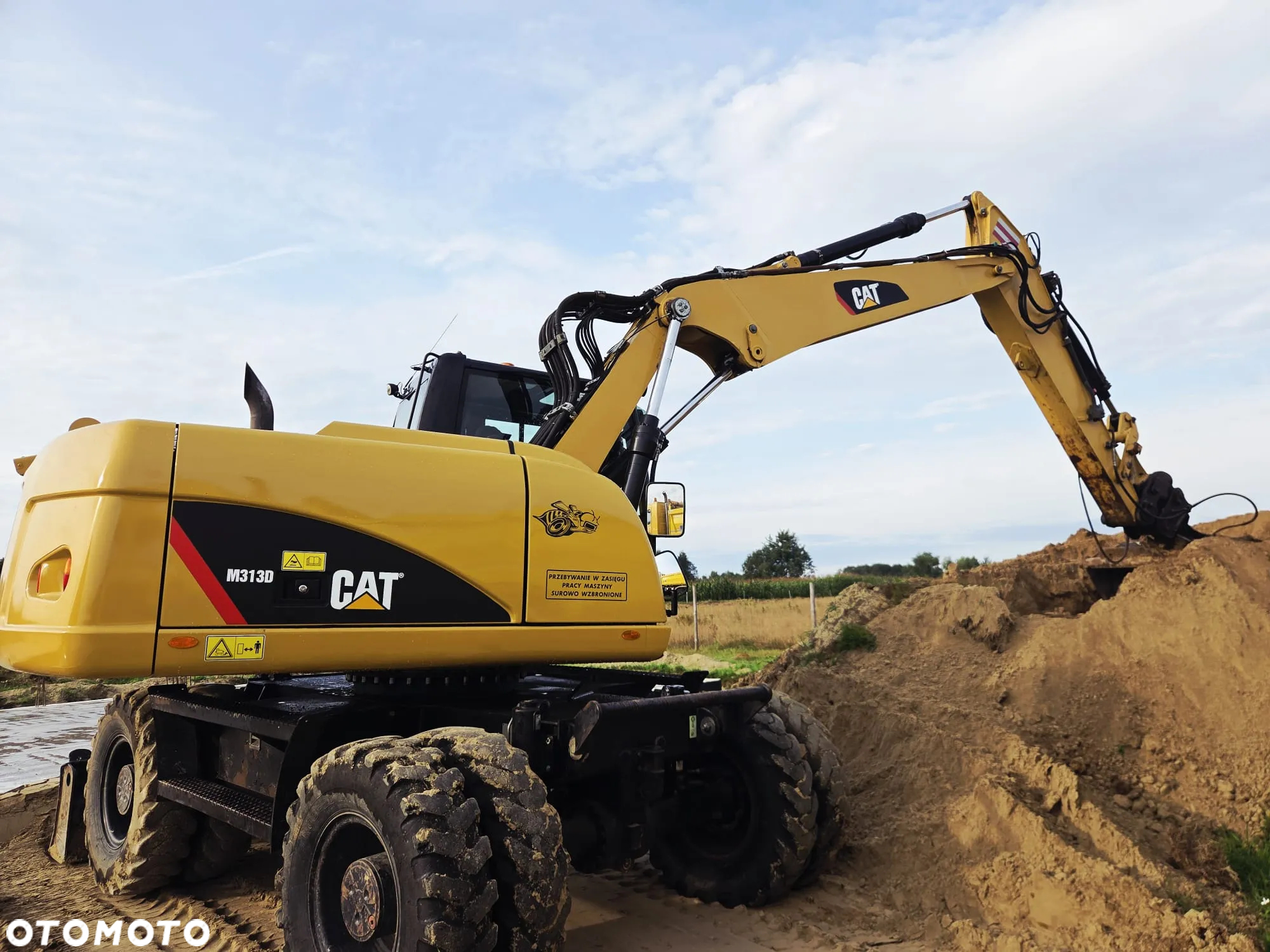Caterpillar M313D - 13