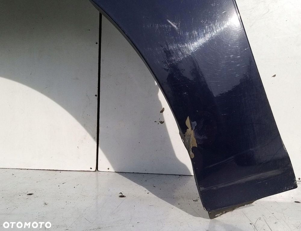 BŁOTNIK PRZEDNI LEWY OPEL ASTRA IV J - 4