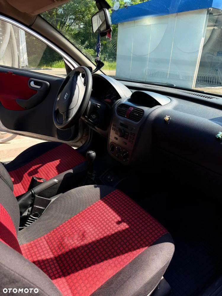 Opel Corsa 1.2 16V Cosmo - 8